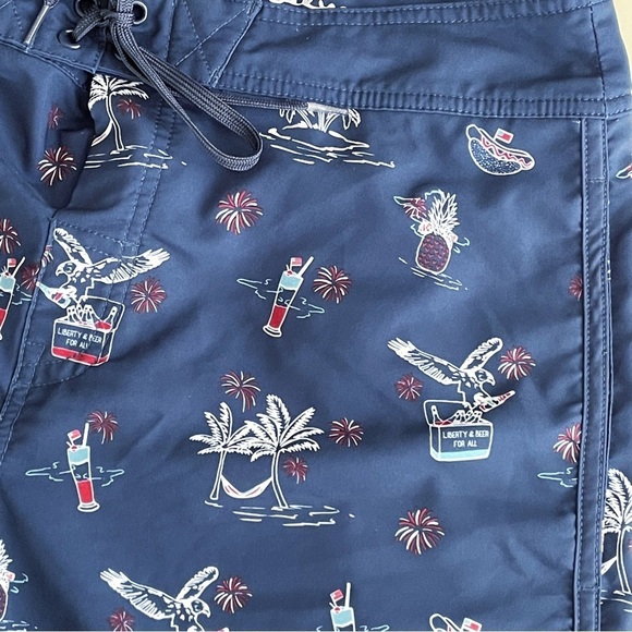 Travis Mathew Men’s Boardshorts Size 33 Flag Sweet Land of Beer - Picture 8 of 10